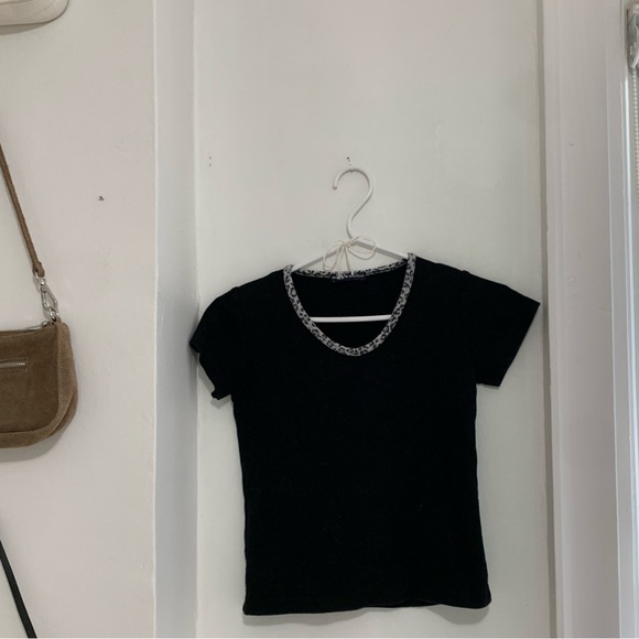 Brandy Melville Black ashlyn top with a cheetah print lining on the top - Picture 1 of 3